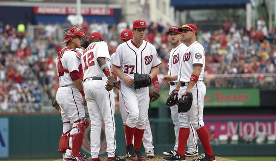 Washington Nationals starting pitcher Stephen Strasburg (37) is pulled from a bseball game during the seventh inning against the Cincinnati Reds, Sunday, July 3, 2016, in Washington. (AP Photo/Nick Wass)
