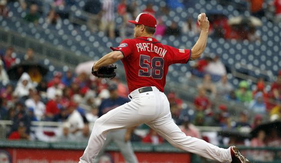 Washington Nationals relief pitcher Jonathan Papelbon throws during the ninth inning of a baseball game against the Milwaukee Brewers at Nationals Park, Monday, July 4, 2016, in Washington. (AP Photo/Alex Brandon)
