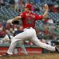 Washington Nationals relief pitcher Jonathan Papelbon throws during the ninth inning of a baseball game against the Milwaukee Brewers at Nationals Park, Monday, July 4, 2016, in Washington. (AP Photo/Alex Brandon)
