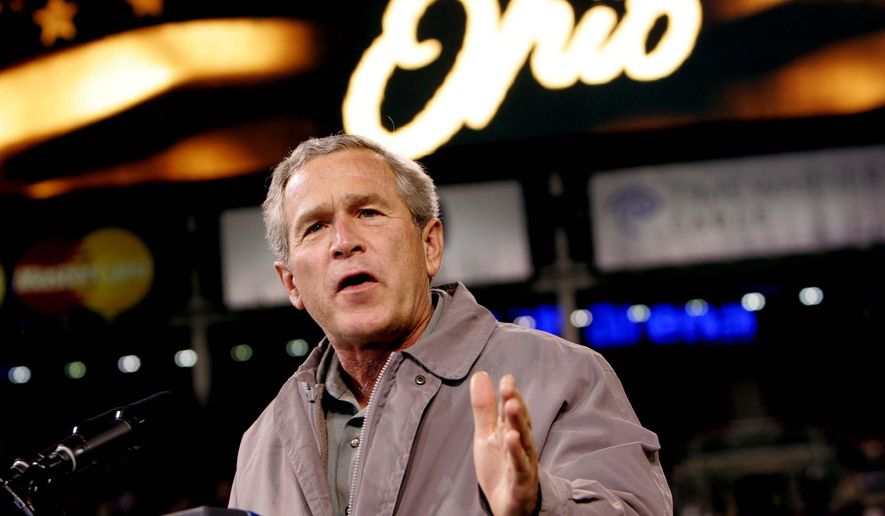 FILE - In this Oct. 31, 2004, file photo, President George W. Bush speaks at a campaign rally at the Great American Ball Park in Cincinnati. Just in time for the Cleveland-hosted Republican National Convention July 2016 and as the general election campaign heats up, a new book, “The Bellwether,” examines Ohio’s importance in picking the nation’s president. Ohio’s electoral votes have been decisive five times, most recently in 2004, when they clinched Bush’s re-election in a tight race that current Secretary of State John Kerry would have won with Ohio. (AP Photo/Pablo Martinez Monsivais, File)