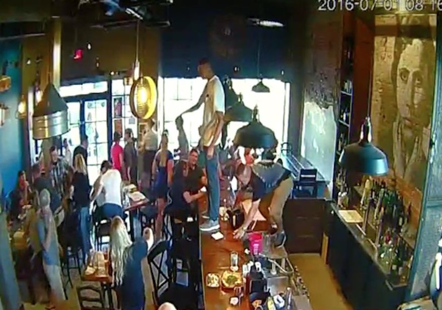 Diners at a restaurant in Idaho were sent into a panic Friday night after a young man stood on top of the bar and praised Allah as the only god. (KTVB)