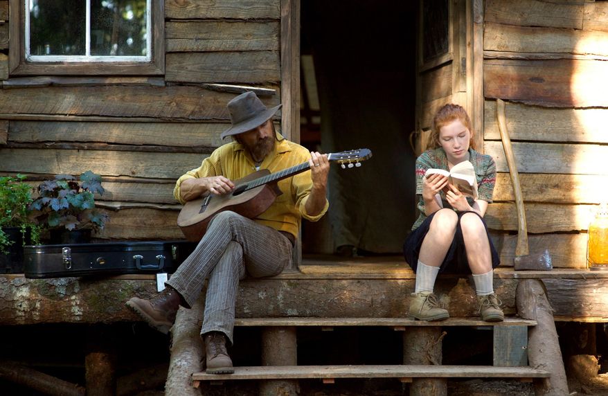 In this image released by Bleecker Street, Viggo Mortensen, left, and Annalise Basso appear in a scene from, "Captain Fantastic." (Wilson Webb/Bleecker Street via AP)