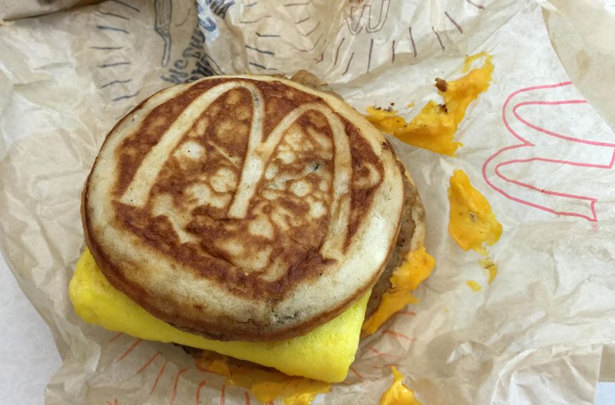 This file photo shows a McDonald's McGriddle sandwich in New York on Jan. 28, 2016. McDonald's says it will expand its all-day breakfast menu with the addition of McGriddles nationally starting in late August. The company is hoping to continue momentum from the launch of a limited all-day breakfast menu from 2015 as it tries to revive slumping sales. (Associated Press) **FILE**