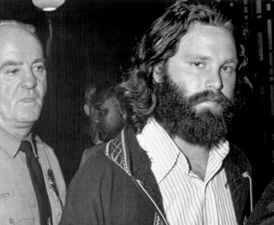 Jim Morrison was raised a military brat, Morrison's family moved often. He spent part of his childhood in San Diego. He completed third grade at the Fairfax County Elementary School Fairfax County, Virginia. His father was stationed at NAS Kingsville in 1952, he attended Charles H. Flato Elementary School in Kingsville, Texas. He continued at St. John's Methodist School in Albuquerque, New Mexico, and then Longfellow School Sixth Grade Graduation Program from San Diego, California. In 1957, Morrison attended Alameda High School in Alameda, California. He graduated from George Washington High School, now George Washington Middle School, in Alexandria, Virginia in June 1961. (AP Photo)