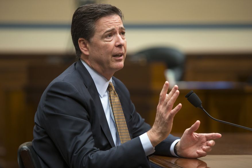 FBI Director James Comey testifies on Capitol Hill in Washington, Thursday, July 7, 2016, before the House Oversight and Government Reform Committee to explain his agency's recommendation to not prosecute Democratic presidential candidate Hillary Clinton over her private email setup during her time as secretary of state. (AP Photo/J. Scott Applewhite)