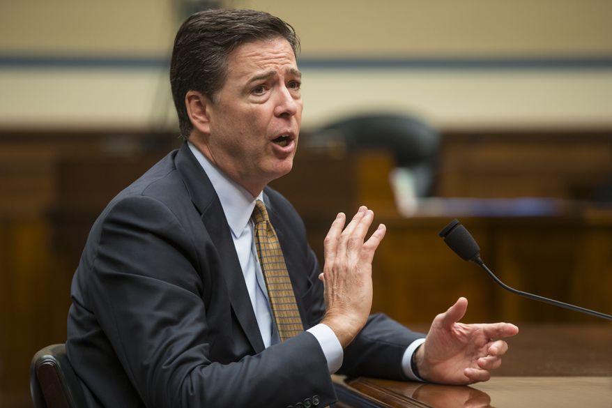 FBI Director James Comey testifies on Capitol Hill in Washington, Thursday, July 7, 2016, before the House Oversight and Government Reform Committee to explain his agency&#39;s recommendation to not prosecute Democratic presidential candidate Hillary Clinton over her private email setup during her time as secretary of state. (AP Photo/J. Scott Applewhite)