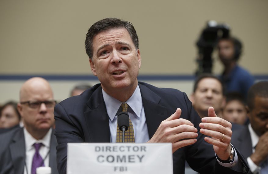 FBI Director James Comey testifies on Capitol Hill in Washington, Thursday, July 7, 2016, before the House Oversight Committee to explain his agency's recommendation to not prosecute Hillary Clinton, now the Democratic presidential candidate, over her private email setup during her time as secretary of state, . (AP Photo/J. Scott Applewhite)
