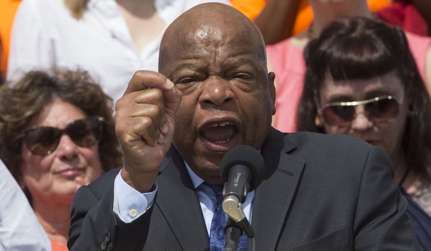 Rep. John Lewis of Georgia told marchers who&#x27;d arrived at the Capitol in a spontaneous, permitless march from the White House that &quot;we stand with you.&quot; (Associated Press)