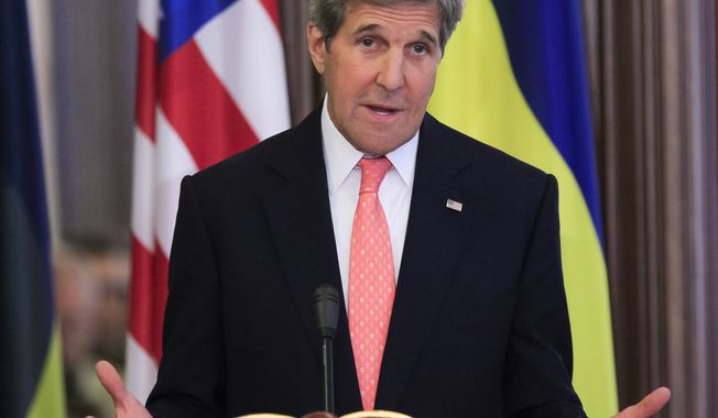 U.S. Secretary of State John Kerry gestures while speaking during his and Ukrainian President Petro Poroshenko news conference after the talks in Kiev, Ukraine, Thursday, July 7, 2016. Kerry is meeting Ukrainian President Petro Poroshenko and others to discuss progress made on reforms called for by agreements reached in Minsk to end the conflict in eastern Ukraine with Russian-backed separatists, which has already seen Moscow annex Crimea. (AP Photo/Sergei Chuzavkov)