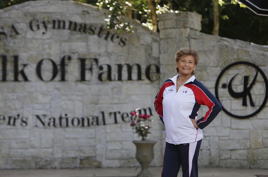 Marta Karolyi stands outside the Karolyi Ranch near New Waverly where she and her husband, Bela Karolyi, train gymnasts, including members of the Women&#39;s National Team, Wednesday, May 4, 2016, in Houston.  In her 16 years as the U.S. women&#39;s national team coordinator, Martha Karolyi has produced the most powerful team in the world, favorites to sweep the team title and a handful of individual medals at the 2016 Olympics.   (Mark Mulligan/Houston Chronicle via AP) **FILE**