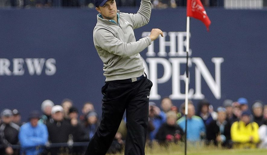 FILE - In this July 20, 2015, file photo, United States' Jordan Spieth makes a wayward drive from the 18th tee during the final round at the British Open Golf Championship at the Old Course, St. Andrews, Scotland. The Open is scheduled for July 14–17, 2016, at Royal Troon Golf Club in Ayrshire, Scotland. (AP Photo/David J. Phillip, File)