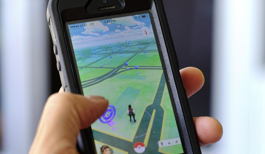 Pokemon Go is displayed on a cell phone in Los Angeles on Friday, July 8, 2016. (AP Photo/Richard Vogel) **FILE**