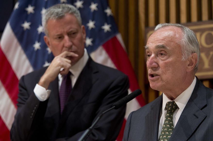 New York City Police Commissioner William Bratton is joined by Mayor Bill de Blasio during a news conference, Friday, July 8, 2016, in New York.  The NYPD is stepping up measures in the wake of the attack on Dallas police. Bratton said officers will double up on patrols for their safety and police presence will be increased at protests. They say there is no credible threat against the police force or the city, and the steps were being taken as a precaution. (AP Photo/Mary Altaffer)