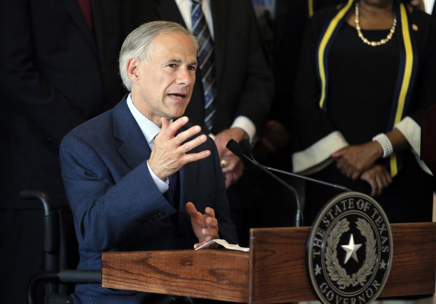 FILE - In this Friday, July 8, 2016 file photo, Texas Gov. Greg Abbott, right, responds to questions about the police shootings during a news conference at City Hall in Dallas. Spokesman Matt Hirsch said Sunday that Abbott was in Jackson Hole, Wyo., Thursday when he was scalded in an accident involving hot water. He sustained "extensive second- and third-degree burns" on both legs below the knees and on both feet and could miss next week's Republican National Convention. Abbott held the press conference in Dallas on Friday, but didn't disclose being burned. (AP Photo/Tony Gutierrez, File)