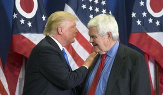 In this photo taken July 6, 2016, then-Republican presidential candidate Donald Trump and former House Speaker Newt Gingrich share the stage during a campaign rally  in Cincinnati. (AP Photo/John Minchillo) ** FILE **