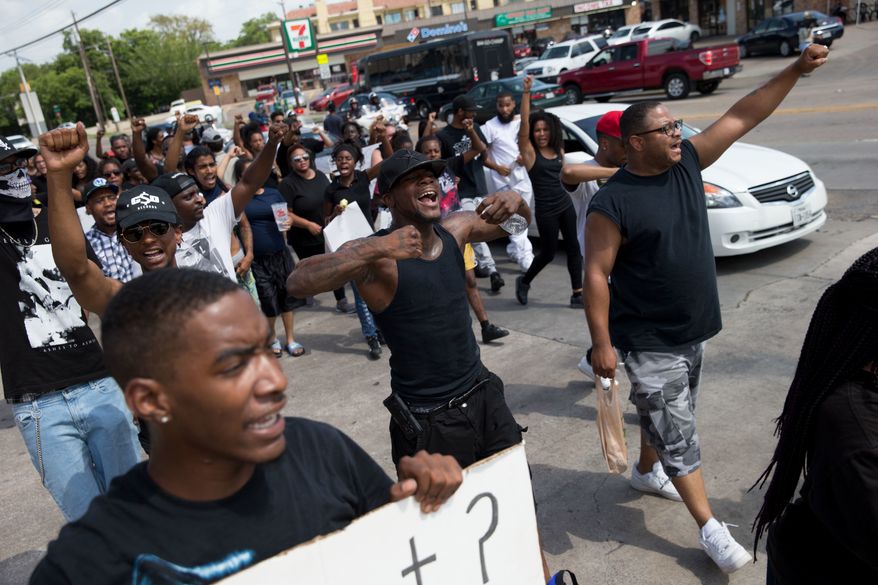 Black Lives Matter protesters march July 10 in Dallas. (Associated Press/File)