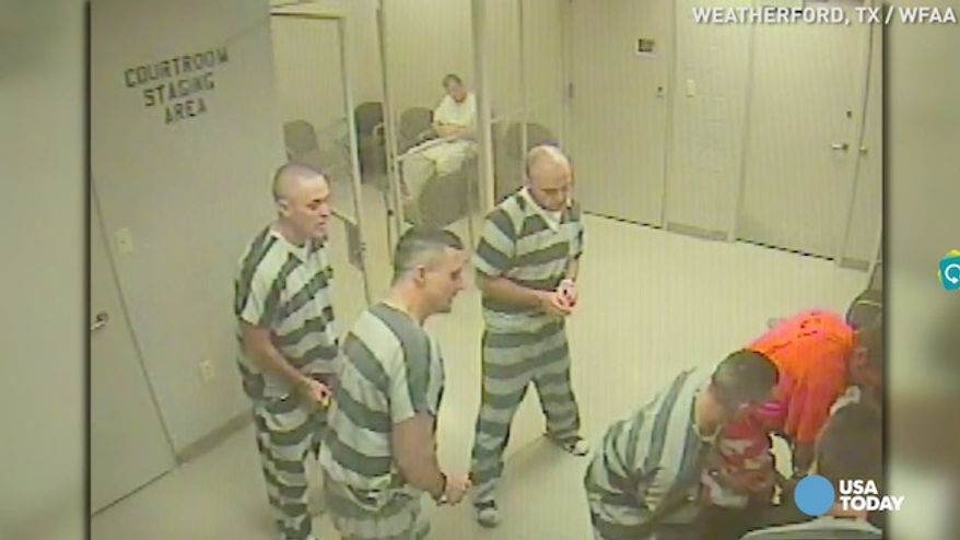 A group of Texas inmates sprang into action after their lone guard suffered an apparent heart attack and lost consciousness. (WFAA via USA Today)