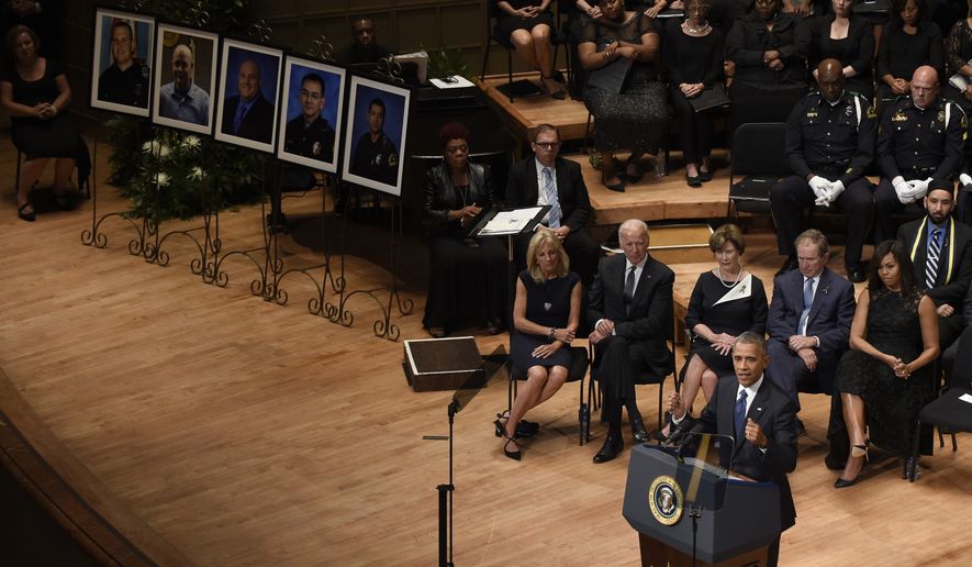 President Barack Obama speaks at an interfaith memorial service for the fallen police officers and members of the Dallas community at the Morton H. Meyerson Symphony Center in Dallas, Tuesday, July 12, 2016. Behind him, from left are, Jill Biden, Vice President Joe Biden, former first lady Laura Bush, former President George W. Bush and first lady Michelle Obama.  (AP Photo/Susan Walsh)