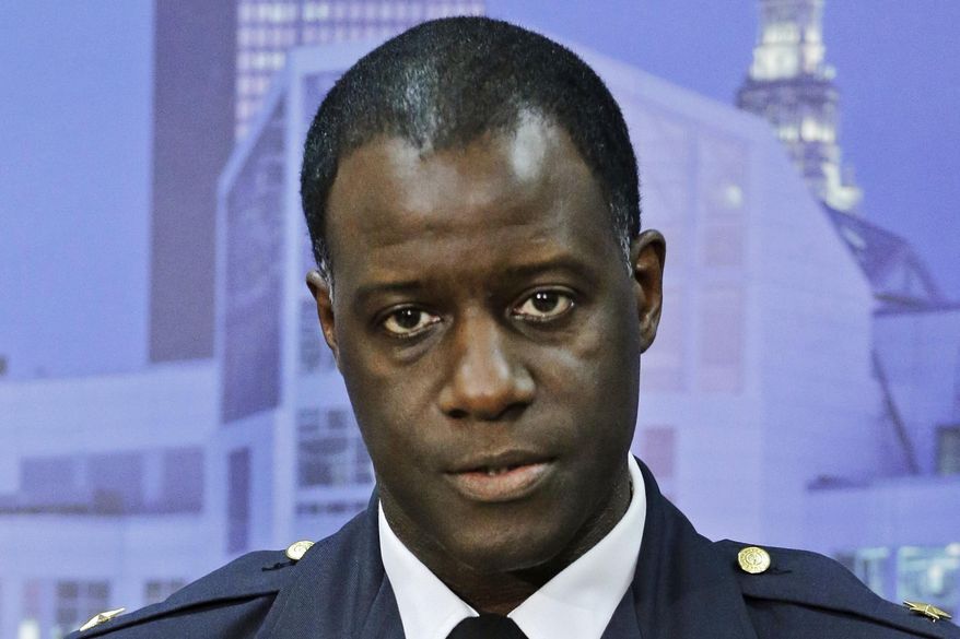 ADVANCE FOR TUESDAY, JULY 12 - FILE - This Nov. 24, 2014, file photo shows Cleveland Police Chief Calvin Williams during a news conference in Cleveland. Rising tensions after the deadly ambush of Dallas police officers have prompted law enforcement officials to adjust security plans for the Republican National Convention in Cleveland from July 18 to 21, 2016, and the Democratic National Convention in Philadelphia from July 25 to 28, 2016. (AP Photo/Mark Duncan, File)