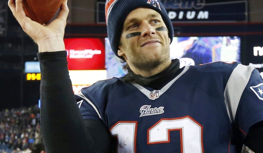 FILE - In this Jan. 10, 2015, file photo, New England Patriots quarterback Tom Brady holds up the game ball after an NFL divisional playoff football game against the Baltimore Ravens in Foxborough, Mass. On Wednesday, July 13, 2016, a federal appeals court has rejected Tom Brady's attempt to get a new hearing on his suspension. Brady was asking for the full 2nd U.S. Circuit Court of Appeals to hear the case. In April, a three-judge panel said that NFL commissioner Roger Goodell was within his powers when he suspended the star quarterback four games for his role in a scheme to doctor the footballs used in a Jan. 18, 2015, playoff game. (AP Photo/Elise Amendola, File)
