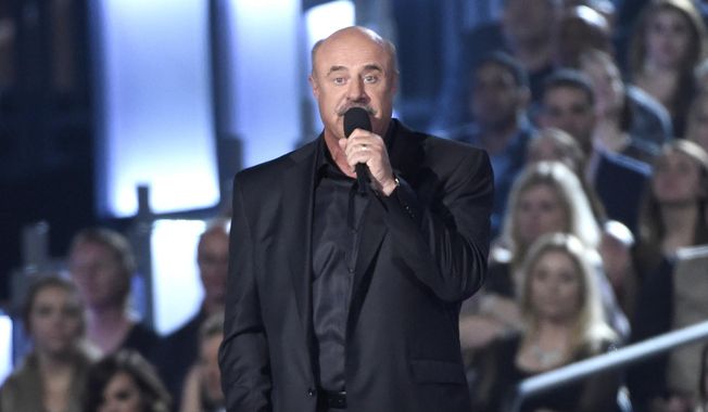 Dr. Phil McGraw speaks on stage at the 50th annual Academy of Country Music Awards at AT&amp;amp;T Stadium, in Arlington, Texas, in this Sunday, April 19, 2015, file photo. (Photo by Chris Pizzello/Invision/AP, File)