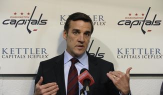 FILE - In this May 15, 2013, file photo, Washington Capitals general manager George McPhee talks with reporters at the Kettler Iceplex in Arlington, Va. A person with direct knowledge of the decision says McPhee has been hired as general manager of the NHL&#39;s expansion Las Vegas franchise. The person spoke on condition of anonymity because owner Bill Foley&#39;s announcement was set for Wednesday afternoon, July 13, 2016. McPhee most recently served as special advisor to New York Islanders GM Garth Snow. Before that he spent 16 seasons as GM of the Washington Capitals.  (AP Photo/Susan Walsh, FIle) **FILE**