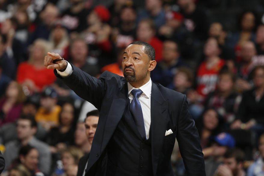 FILE - In this Jan. 15, 2016, file photo, Miami Heat assistant coach Juwan Howard gestures during the second half of an NBA basketball game in Denver. Summer league is a chance for players to get noticed and maybe have a shot at making it in the NBA. Same goes for coaches. That's why NBA assistants like Juwan Howard and Patrick Ewing embraced the chance to run rosters this summer. (AP Photo/David Zalubowski, File)