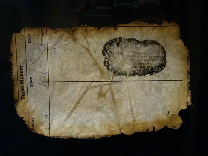 In this image provided by the 9/11 Memorial Museum a piece of art, created by Doug and Mike Starn, from paper blown from the World Trade Center on 9/11 and entitled "Fallen #6," is part of a special 15th anniversary exhibit at the 9/11 Memorial Museum by 13 artists who have filtered a day of terror often with personal links into works of both grief and tenderness. (AP Photo/ 9/11 Memorial Museum).