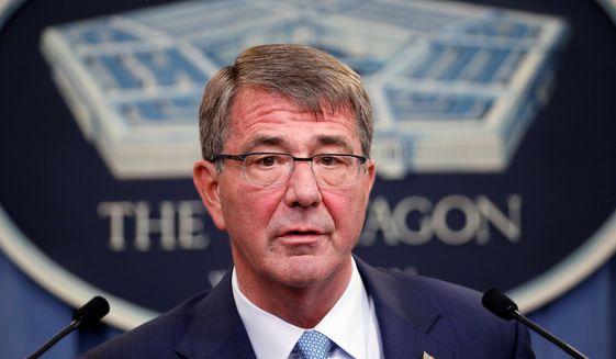 Defense Secretary Ashton Carter says transgenders are being hurt by an outdated approach that distracts commanders. (Associated Press)