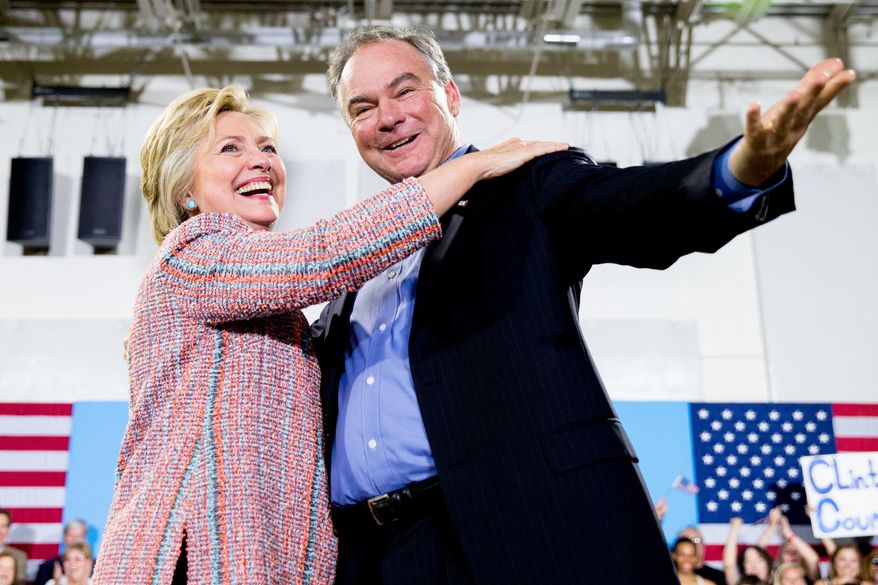 Democratic presidential candidate Hillary Clinton, accompanied by Sen. Tim Kaine, D-Va., speaks at a rally at Northern Virginia Community College in Annandale, Va., Thursday, July 14, 2016. Kaine has been rumored to be one of Clinton&#x27;s possible vice president choices. (AP Photo/Andrew Harnik)
