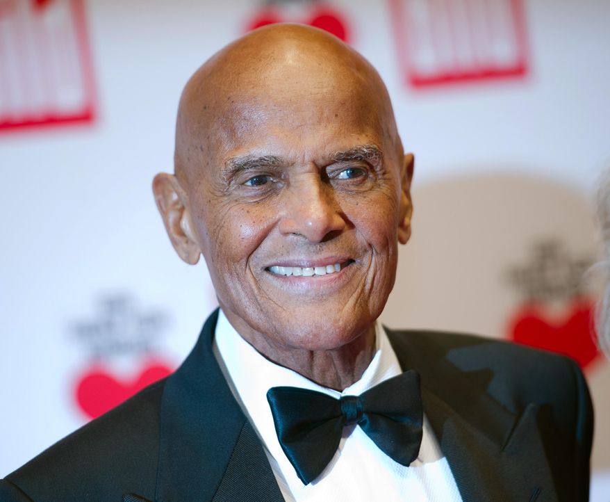FILE - In this Dec. 6, 2014 file photo, Harry Belafonte arrives at the charity gala Ein Herz fuer Kinder (A heart for children) in Berlin. Belafonte will launch a racial and social justice festival in October and the inaugural event will include appearances and performances from actors Chris Rock and Jesse Williams and musicians John Legend and Common. (AP Photo/Steffi Loos, File)