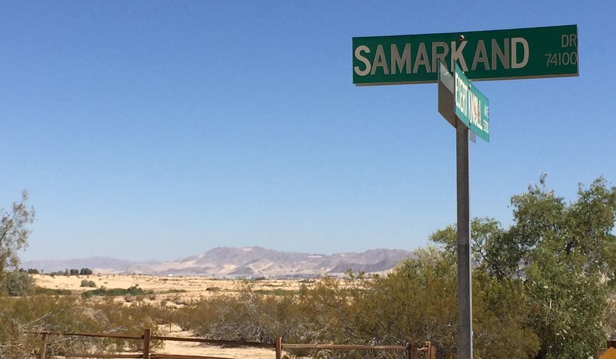 This undated photo shows the site of where three children were found in the desert off Samarkand Drive in Twentynine Palms, Calif. A homeless couple was arrested after the woman's three young children were punished by being sent into a California desert without shoes or water, authorities said Thursday. (Denise Goolsby/Palm Springs Desert Sun via AP)