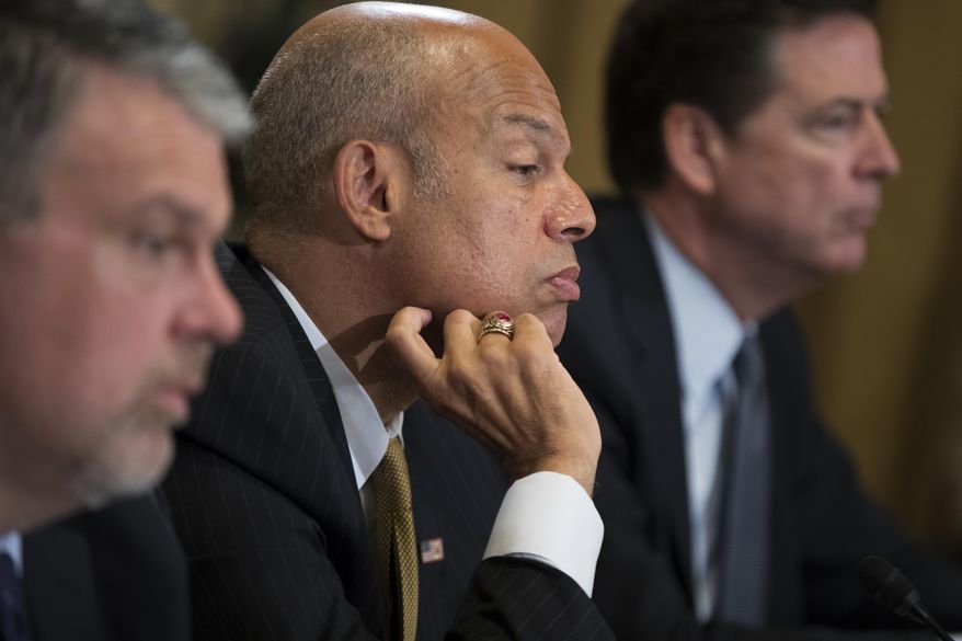 FBI Director James Comey, right, Homeland Security Secretary Jeh Johnson, center, and Office of the Director of National Intelligence National Counterterrorism Center Director Nicholas Rasmussen testify on Capitol Hill in Washington, Thursday, July 14, 2016, before the House Homeland Security hearing on "Worldwide Threats to the Homeland: ISIS and the New Wave of Terror." (AP Photo/Evan Vucci)