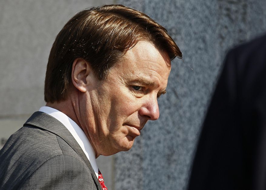 FILE - In this Friday, March 25, 2012 file photo, former U.S. presidential candidate and Sen. John Edwards arrives at a federal court for the sixth day of jury deliberations in Greensboro, N.C.. (AP Photo/Gerry Broome, File)