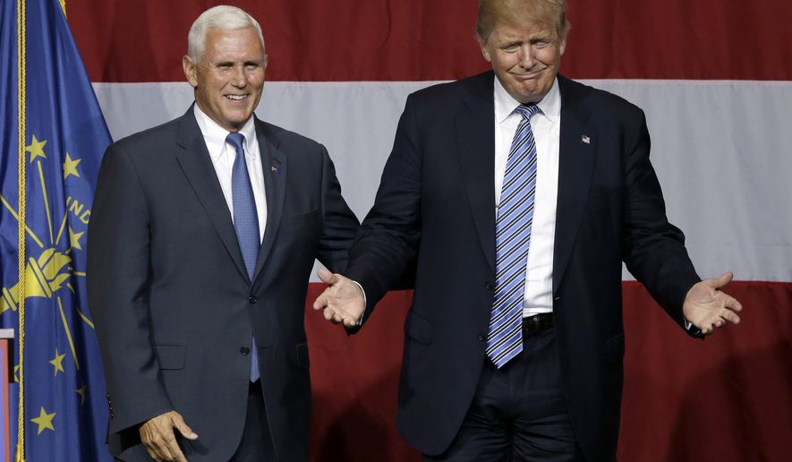 In this July 12, 2016 photo, Indiana Gov. Mike Pence joins Republican presidential candidate Donald Trump at a rally in Westfield, Ind. Over the past two decades, Trump has disagreed with his vice-presidential pick on plenty of political issues, including immigration policy, entitlement programs and trade. On social issues above all, Trump and Pence arrive at the 2016 general election from very different paths. (AP Photo/Michael Conroy, File)