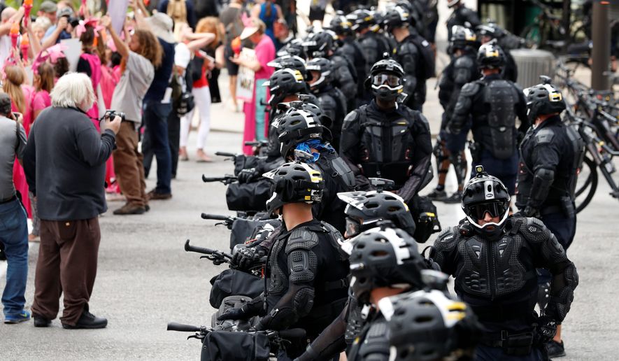 Police presence in Cleveland for the Republican National Convention is expected to be sizable amid security concerns and fears that standoffs between pro- and anti-Trump factions may turn violent. (Associated Press)