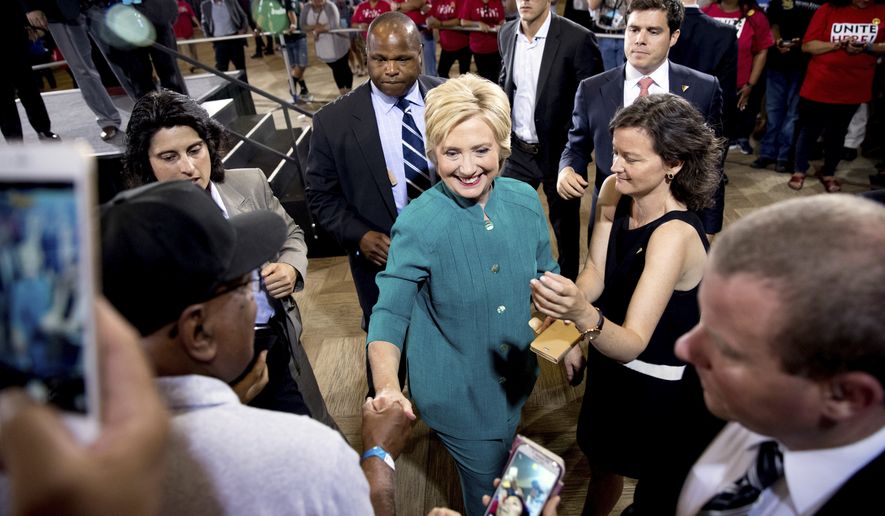 Democratic presidential candidate Hillary Clinton greets supporters after speaking at a rally at the Culinary Academy of Las Vegas in Las Vegas, Tuesday, July 19, 2016. (AP Photo/Andrew Harnik)