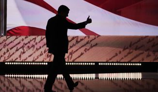 Sen. Ted Cruz, R-Tex., flashes a thumbs up as he leaves the stage during the third day of the Republican National Convention in Cleveland, Wednesday, July 20, 2016. (AP Photo/J. Scott Applewhite)