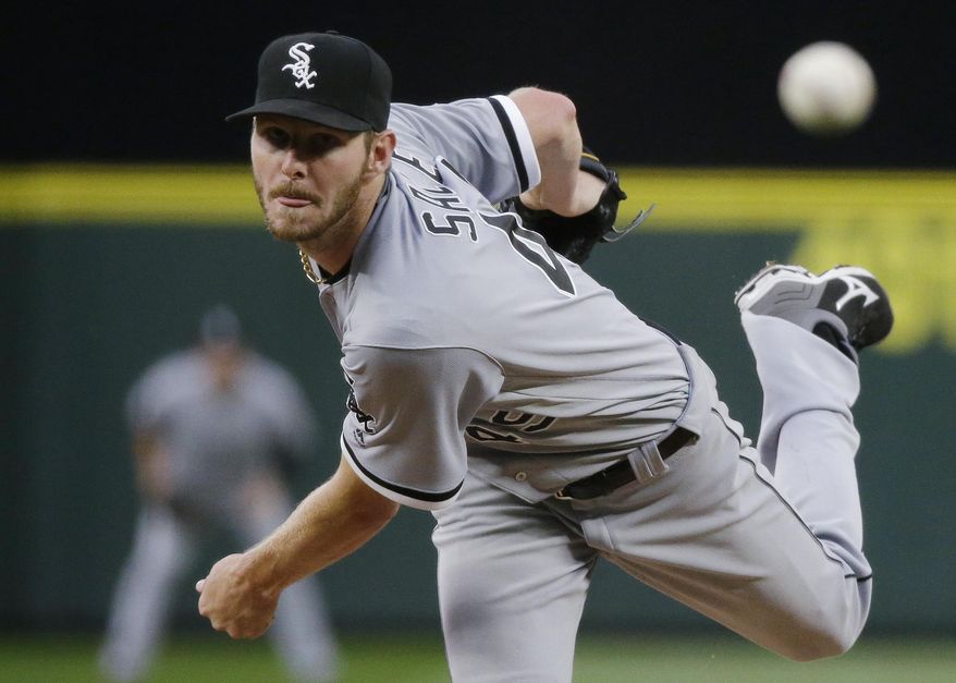 FILE - In this Monday, July 18, 2016, file photo, Chicago White Sox starting pitcher Chris Sale throws to a Seattle Mariners batter during a baseball game in Seattle. Sale has been scratched from his start against the Detroit Tigers after he was involved in what the team says was a "non-physical clubhouse incident." The White Sox declined to describe the incident, but said it's "currently under further investigation by the club" and that Sale was sent home from the park. (AP Photo/Ted S. Warren, File)