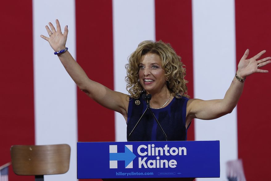 In this Saturday, July 23, 2016 photo, DNC Chairwoman, Debbie Wasserman Schultz speaks during a campaign event for Democratic presidential candidate Hillary Clinton during a rally at Florida International University Panther Arena in Miami. On Sunday, Wasserman Schultz announced she would step down as DNC chairwoman at the end of the party's convention, after some of the 19,000 emails, presumably stolen from the DNC by hackers, were posted to the website Wikileaks. (AP Photo/Mary Altaffer)