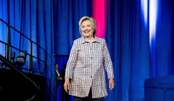 Democratic presidential candidate Hillary Clinton arrives to speak at the 117th National Convention of Veterans of Foreign Wars at the Charlotte Convention Center in Charlotte, Monday, July 25, 2016. (AP Photo/Andrew Harnik)