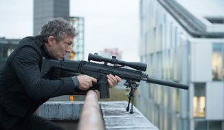 In this image released by Universal Pictures, Vincent Cassel appears in a scene from &quot;Jason Bourne.&quot; (Jasin Boland/Universal Pictures via AP)