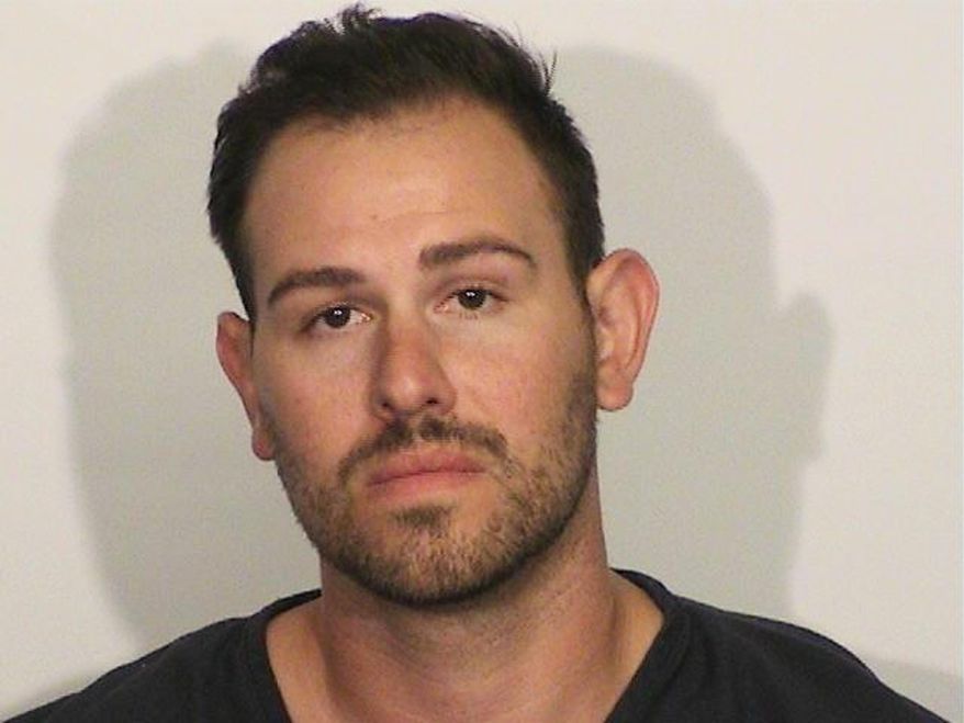 This Saturday, July 23, 2016 photo provided Tuesday, July 26, by Douglas County Sheriff's Office shows Keith Weglin, 29, of Sacramento, California, taken at the Douglas County Jail in Minden, Nev. Weglin was arrested for disorderly conduct after Justin Timberlake said he got too physical with him last weekend during the American Century Celebrity Golf Championship at Lake Tahoe, sheriff's officials said Tuesday. (Douglas County Sheriff's Office via AP)