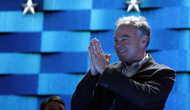 Democratic Vice Presidential candidate, Sen. Tim Kaine, D-Va., looks over the podium as he checks out the stage before the start of the third day session of the Democratic National Convention in Philadelphia, Wednesday, July 27, 2016. (AP Photo/Carolyn Kaster)
