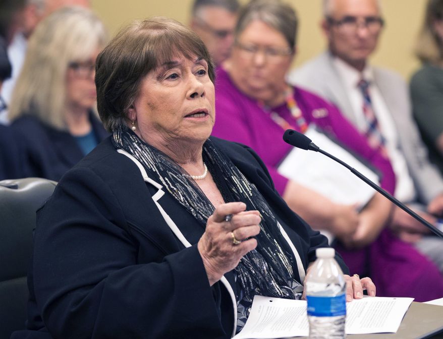 Phyllis Gilmore, Department for Children and Families Secretary, answers questions about the audit of her department at a Post Audit Committee meeting Wednesday, July 27, 2016 in Topeka, Kan. The Kansas Department of Children and Families continuing struggles to adequately oversee private foster care contractors is putting children in the system at risk, according to a state audit of the agency released Wednesday. (Emily DeShazer/The Topeka Capital-Journal via AP) MANDATORY CREDIT