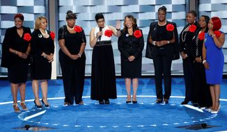 Sybrina Fulton, Geneva Reed-Veal, Lucy McBath, Gwen Carr, Cleopatra Pendleton, Maria Hamilton, Lezley McSpadden and Wanda Johnson from Mothers of the Movement speak during the second day of the Democratic National Convention on Tuesday in Philadelphia. (Associated Press)