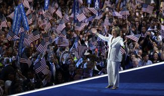 Hillary Clinton takes the stage during the final day of the Democratic National Convention on Thursday in Philadelphia. (Associated Press)