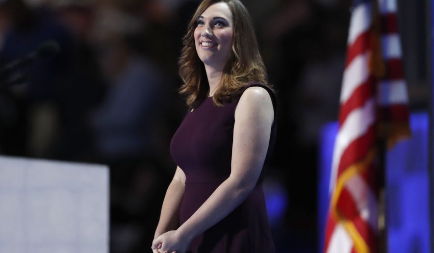 LGBT rights activist Sarah McBride takes the stage during the final day of the Democratic National Convention in Philadelphia , Thursday, July 28, 2016. (AP Photo/Paul Sancya)