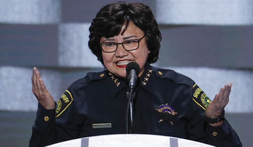 Dallas County Sheriff Lupe Valdez, whose city was the scene of the ambush that left five police officers dead and seven wounded earlier this month, asked for the moment of silence. (Associated Press)