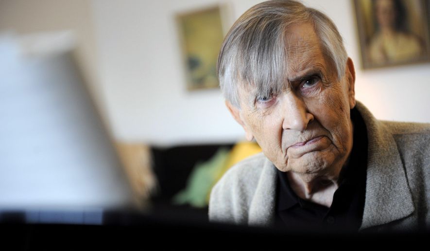 FILE - In this Oct. 9, 2008 file photo, Finnish composer Einojuhani Rautavaara is pictured at his home in Helsinki. Einojuhani Rautavaara, arguably Finland’s most famous classical composer since the era of Jean Sibelius, has died on July 27, 2016 at the age of 87. Rautavaara produced eight symphonies, seven operas, 14 concertos and dozens of other orchestral and vocal compositions. He achieved international fame with his seventh symphony, “Angel of Light,” in 1994. (Mikko Stig/Lehtikuva via AP, file)